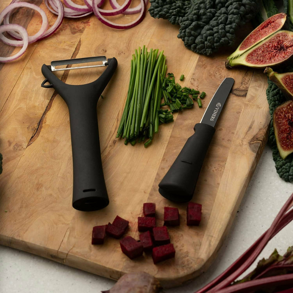 KYOCERA > 2 piece set includes two practical tools in the kitchen a paring  knife and peeler