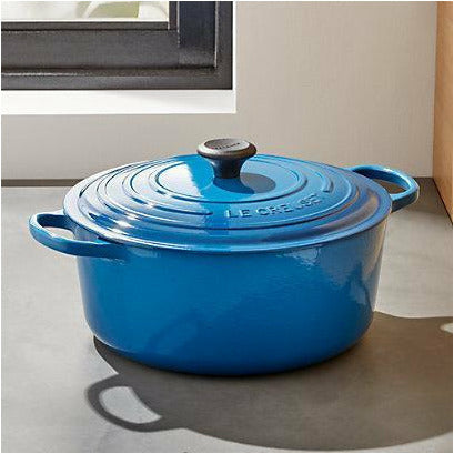 https://tarzianwestforhousewares.com/cdn/shop/products/le-creuset-signature-9-qt.-round-marseille-blue-french-oven-with-lid_1800x1800.jpg?v=1662994154